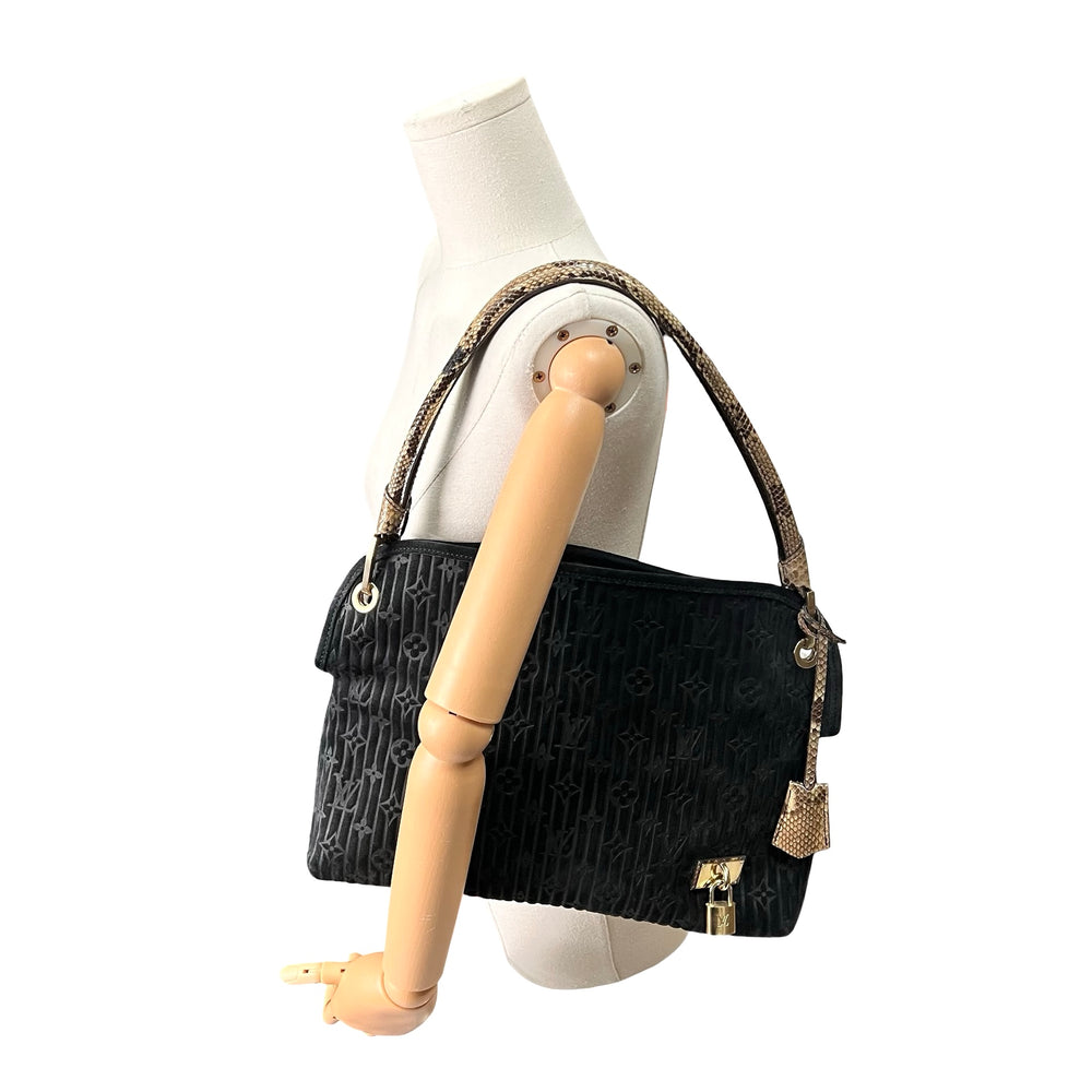 Bolsa Louis Vuitton Monogram Suede Whisper PM