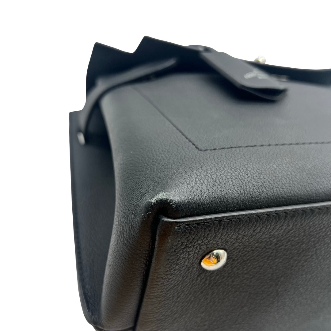 Bolsa Louis Vuitton LockMe Ever MM
